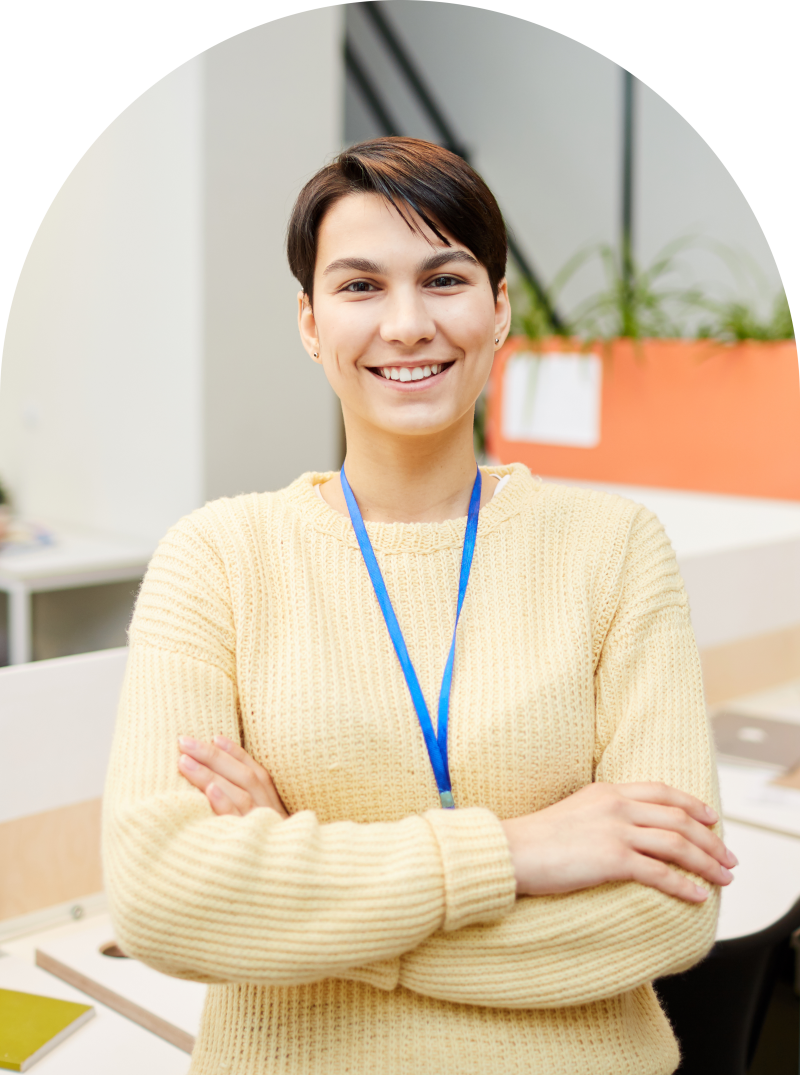 smiling woman with arms crossed